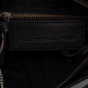 A black alligator printed leather "Classic hip" bag by Balenciaga.