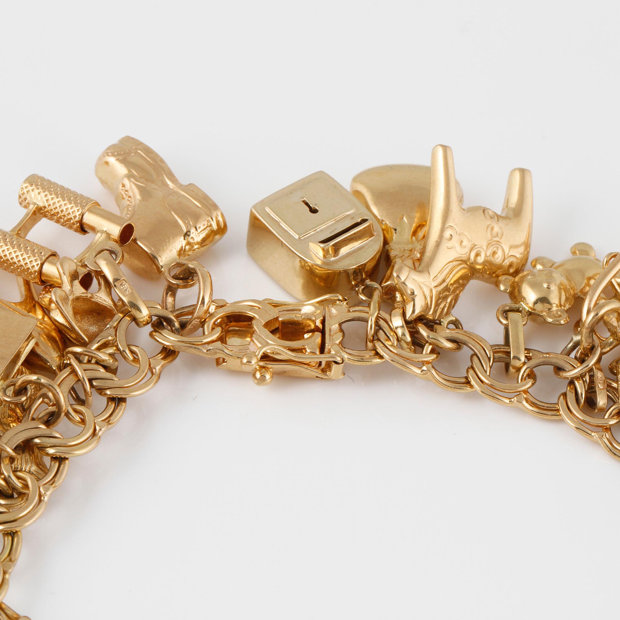 BERLOCKARMBAND, 18K guld, Sture Viberg, Aveta, 1963. Vikt 57,0 gram.