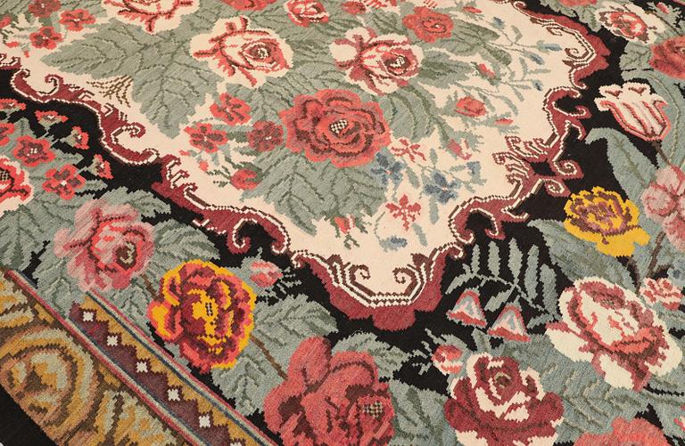 An older Bessarabian Kelim carpet, 380 x 240 cm.