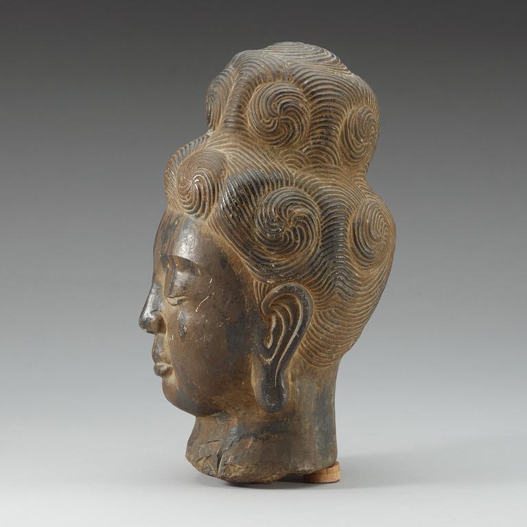 A Ming-style stone head of Buddha.