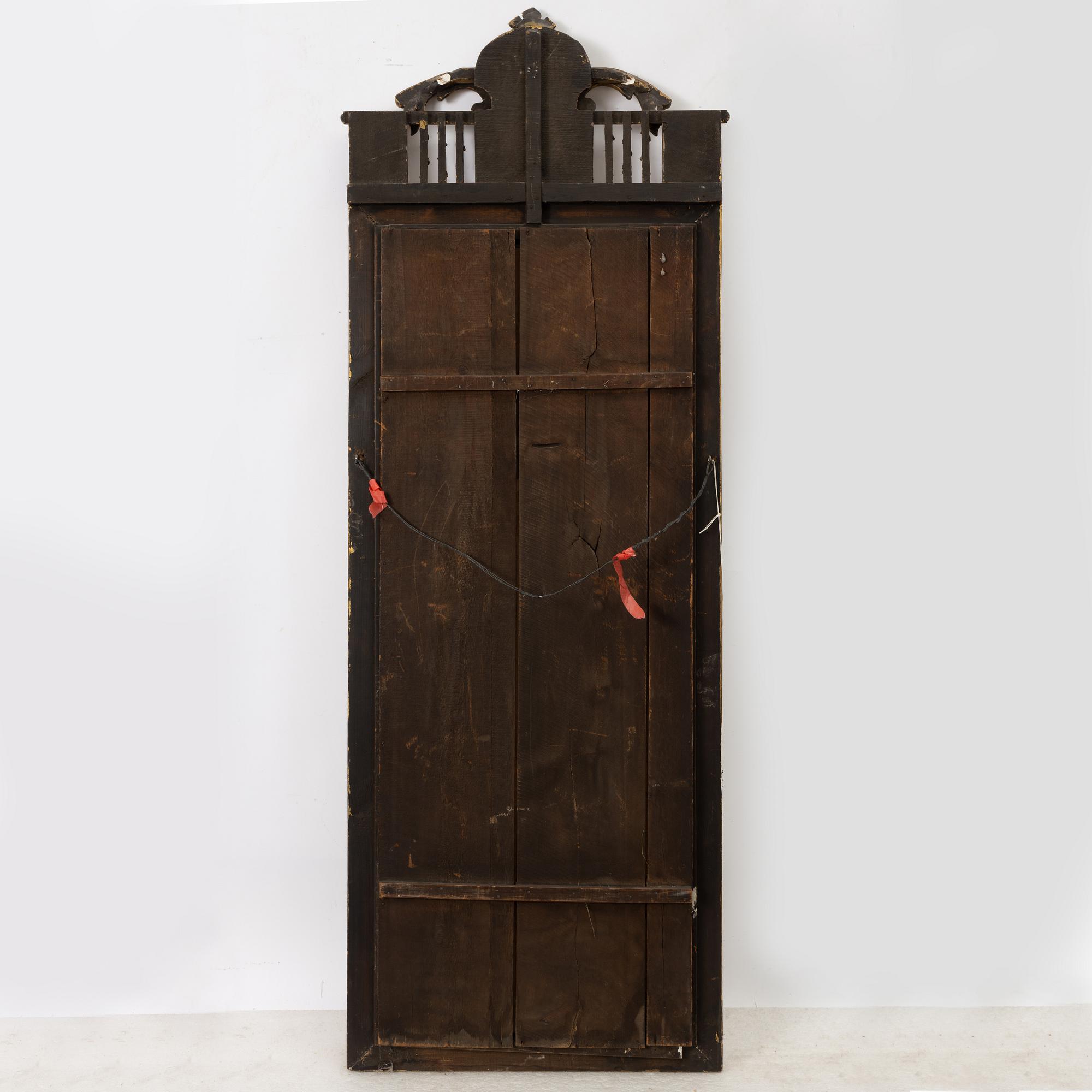 A mirror, Empire, 19th century.