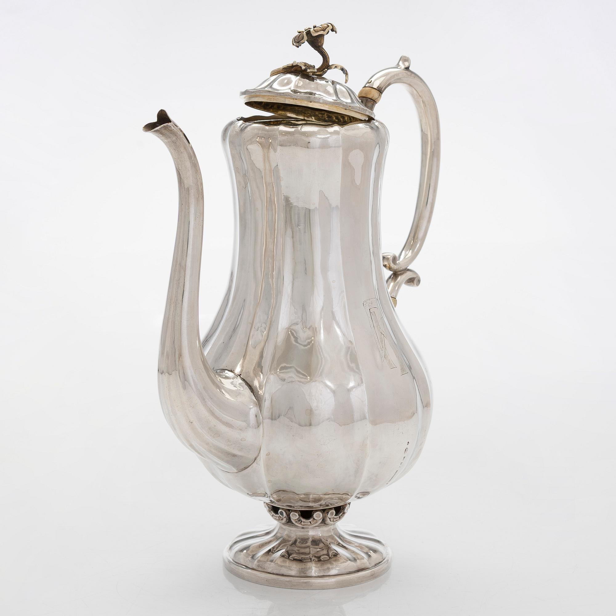 A parcel-gilt coffee pot, maker's mark of Johan Gustaf Ettinger, Vyborg 1861.