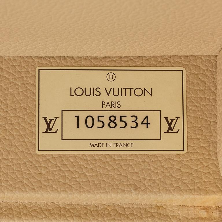 Louis Vuitton, A 'Alzer 60' travel bag, 2002.