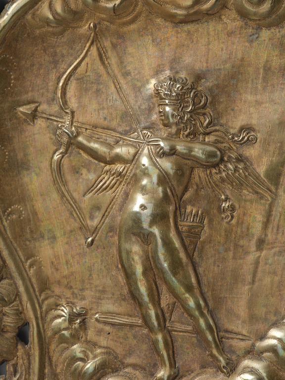 A set of four Swedish Baroque repoussé silvered brass reflector one-branch reflector plates, ca 1690-1700.