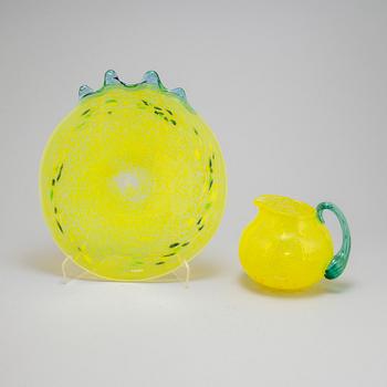GUNNEL SAHLIN, a glas plate and pitcher, Kosta Boda, signed.