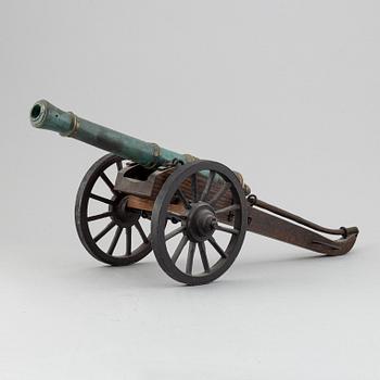 A copy of a field canon with monogram of king  Karl XII produced by Svensk Metallkonst, Carlscrona in late 20th century.