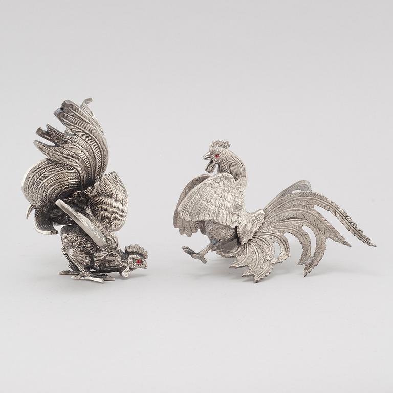 A pair of table decorations in white metal, second half of the 20th century.
