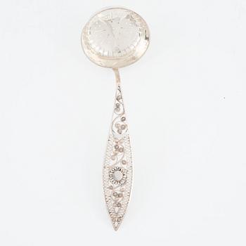 Gustaf Folcker, a silver sugar spoon with filigree, Stockholm 1814.