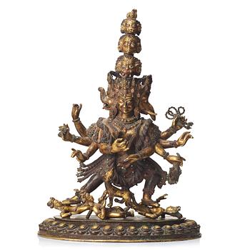 658. A large Tibetan eight armed deity, probably 20th Century.