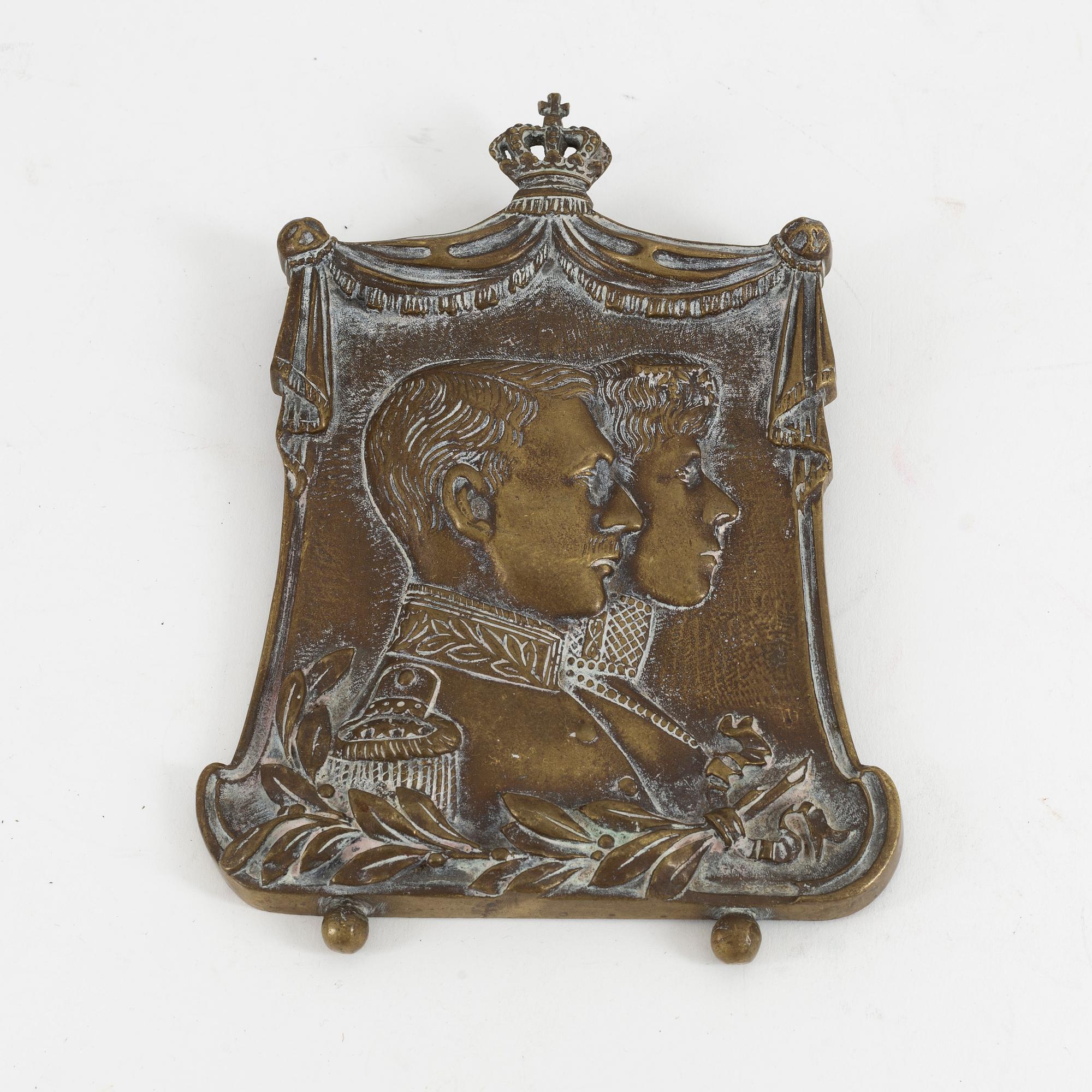 A 19th century bronze plaque.