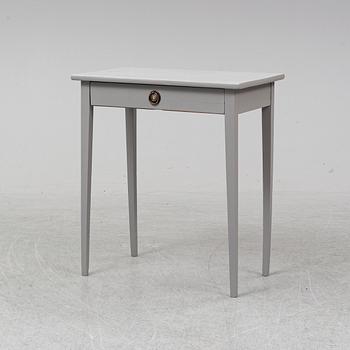 A painted table, 19th Century.