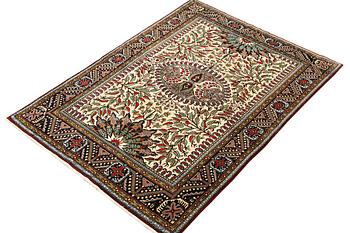 A Sarouk rug, c. 220 x 144 cm.