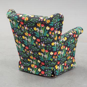 A sofa and wingback chair, later part of the 20th Century.