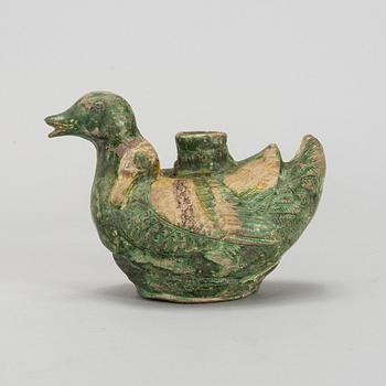 A green and yellow glazed bisquit duckshaped ewer, Ming dynasty (1368-1644).