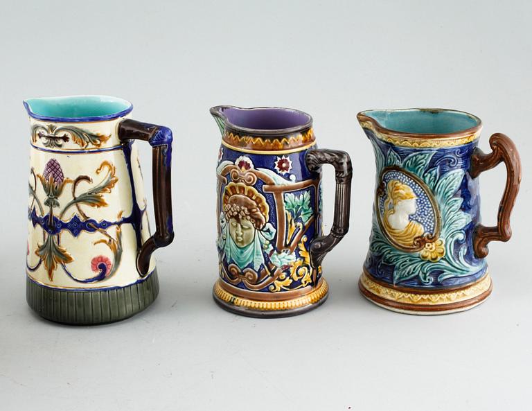 Three majolica jugs from Rörstrand and three majolica pitchers from late 19th century.
