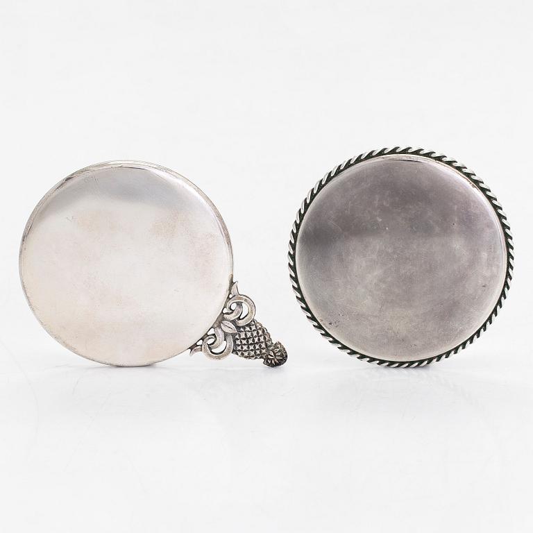 Tiffany & Co, two sterling silver hand mirrors.