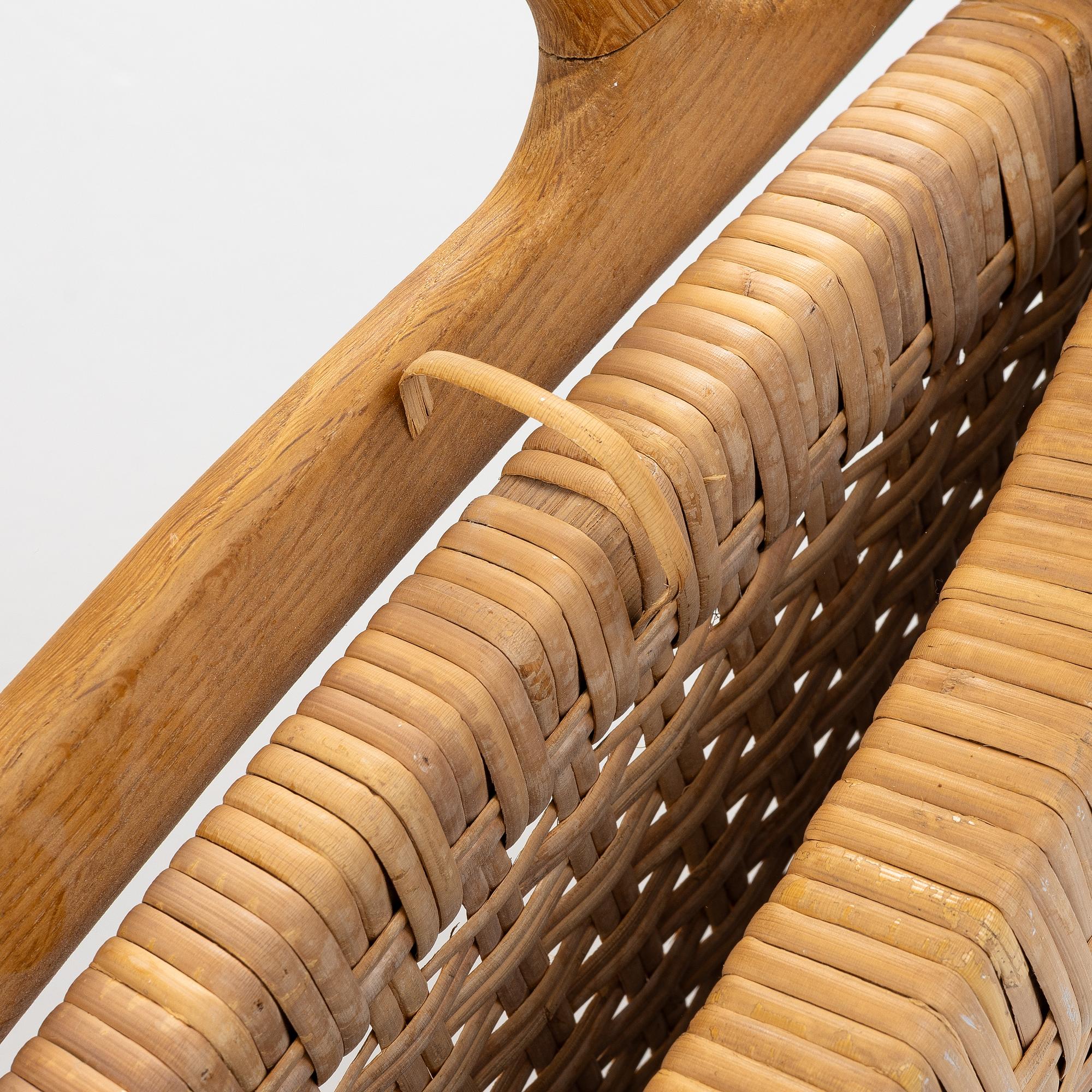 Hans J. Wegner, A folding chair, JH 512, Johannes Hansen, Denmark.