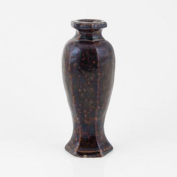 A brown glazed vas, Ming dynasty (1368-1644).