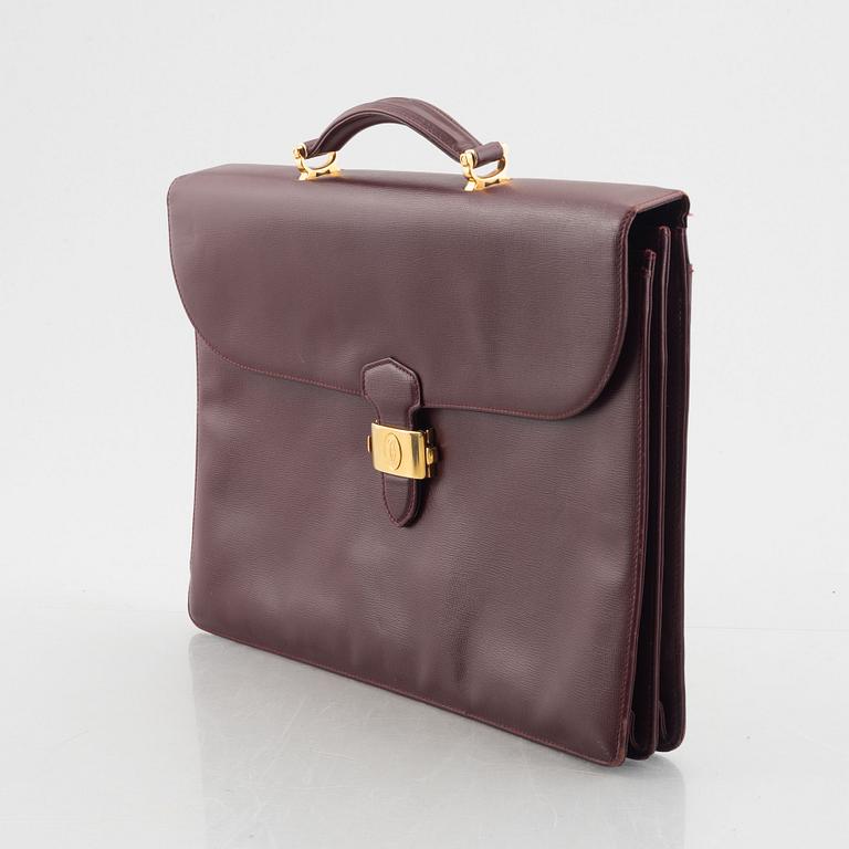 Cartier, a briefcase.