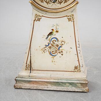 An 18th Century painted long case clock.