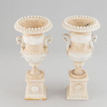 A pair of 20th century alabaster vases.