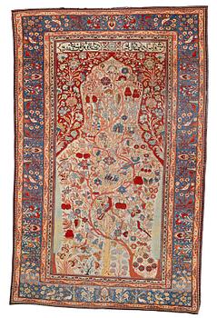 A RUG, a semi-antique Kashan Motachem figural, ca 211 x 134 cm.