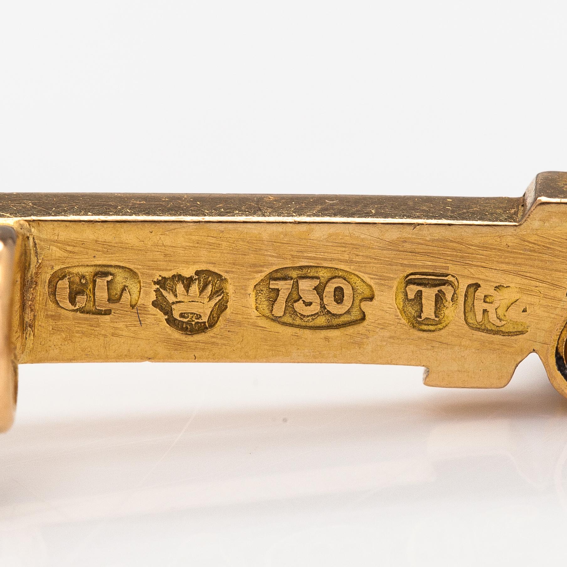 Broscher, 2 st, 18K guld, safir, diamant ca 0.03 ct och odlade pärlor.