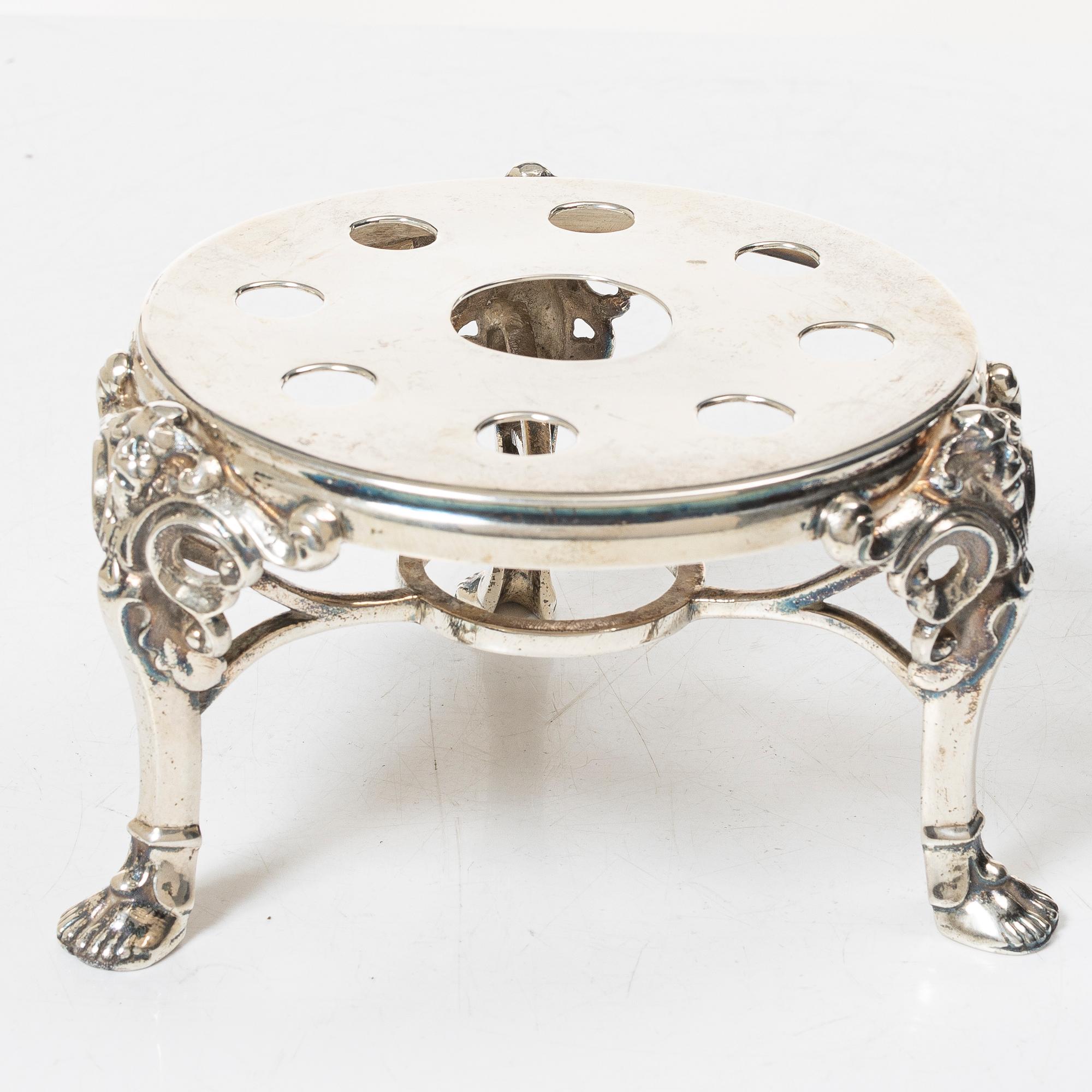 Base/holder for a burner, sterlingsilver, 20th century.