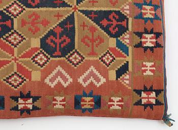 CARRIAGE CUSHION. Rölakan (flat weave). Ca 54 x 106 cm. Skåne first half of the 19th century.