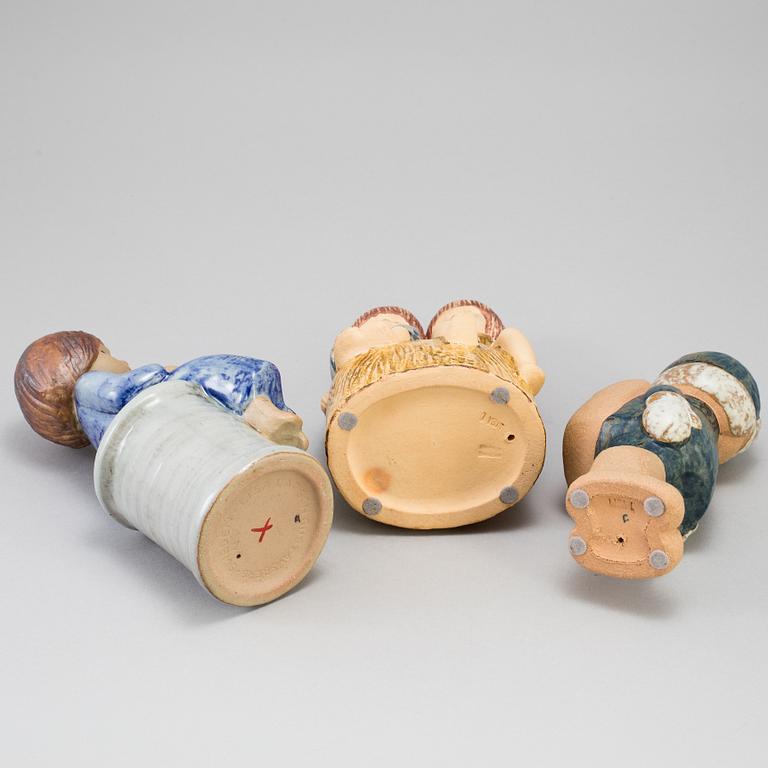 a set of three stoneware figurines by Lisa Larson for Gustavsberg.