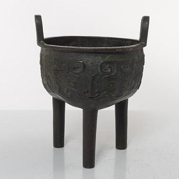 A Chinese tripod bronze censer, Ming style, Qing dynasty (1644-1912).