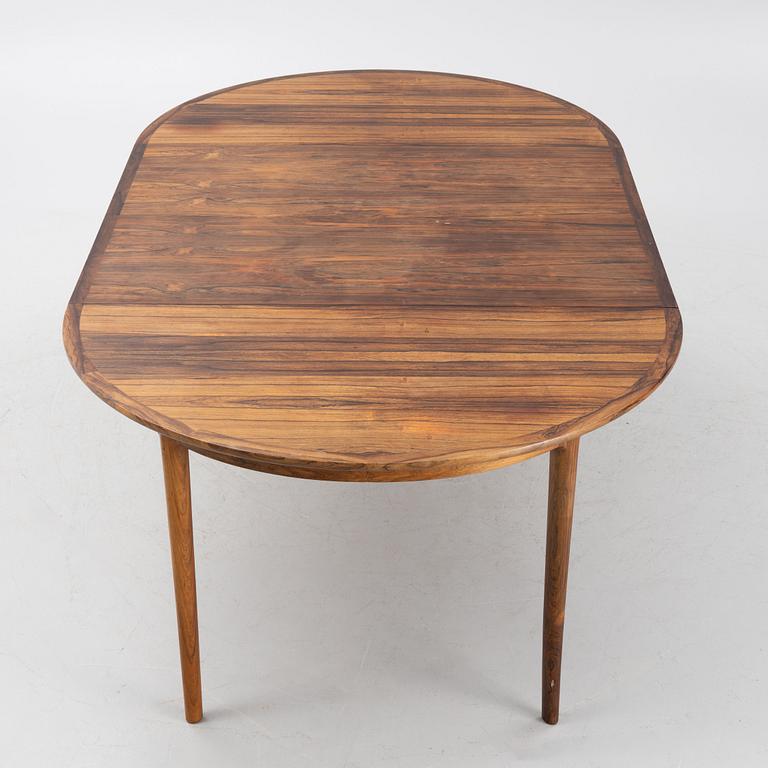 A Rosewood dining table and four chairs, Denmark. 1960-tal.