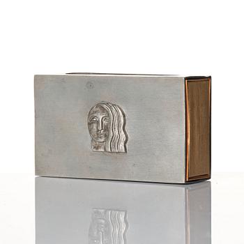 Firma Svenskt Tenn, a pewter matchbox case with beaker, models "38d" and "185a", with decor by Anna Petrus, Stockholm 1927-28.