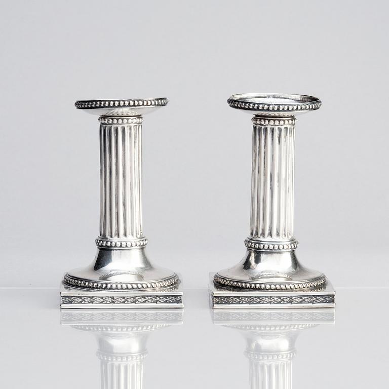 A Swedish pair of 18th century Gustavian silver candlesticks, marks of Johan Ekholm, Stockholm 1795.