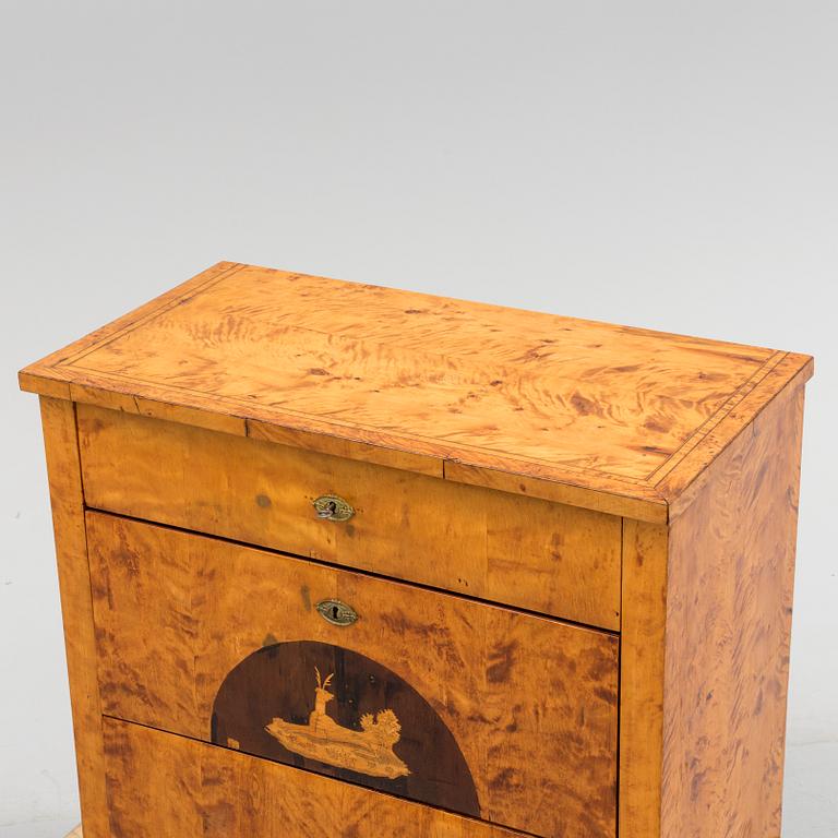 A mid 19th century chest of three drawers.