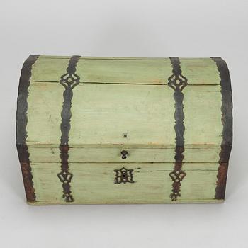 A wooden storage chest dated year 1777.