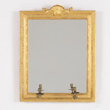 A "Meunier" mirror wall lamp from IKEA's 18th-century series, late 20th century.