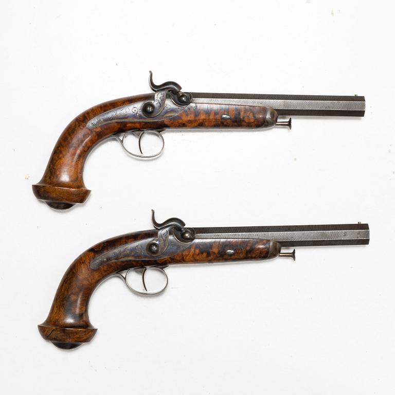 A piar of French percussion pistols, signed Aury, St. Etienne, 1850-80.