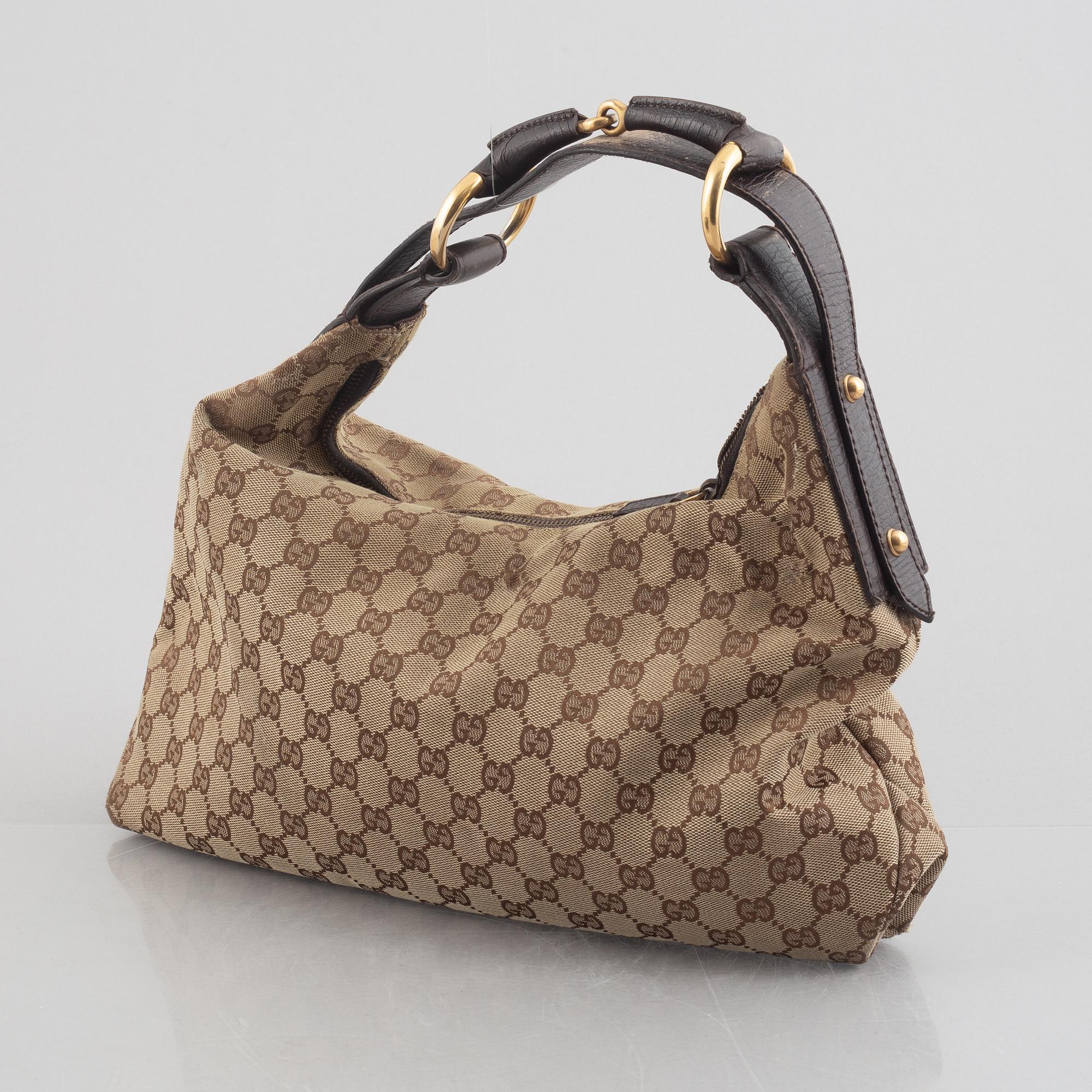 Gucci, a handbag.
