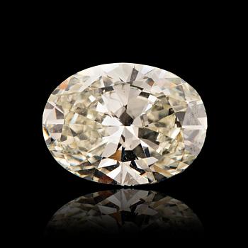 1154. An oval brillant-cut diamond 2.94 cts quality ca K/L - si2/p1.