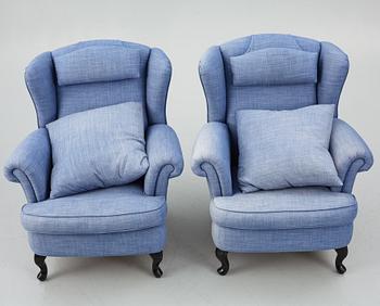 Fåtöljer ett par, med fotpallar, Bröderna Andersson.