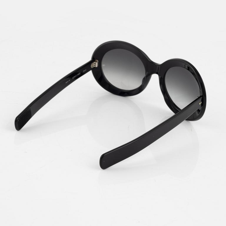 Oliver Goldsmith, a pair of black, "Koko" sunglasses.
