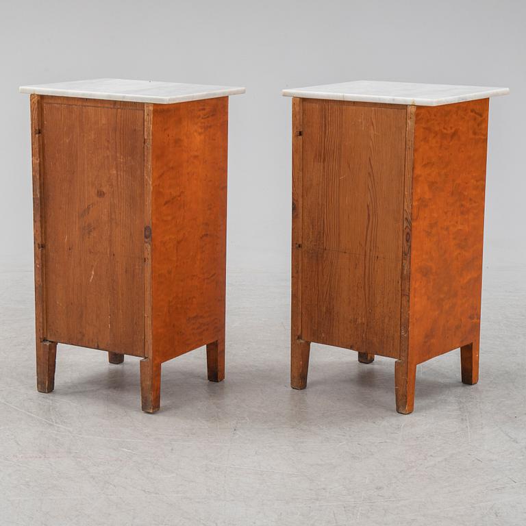 A pair of early 20th century bedside tables.