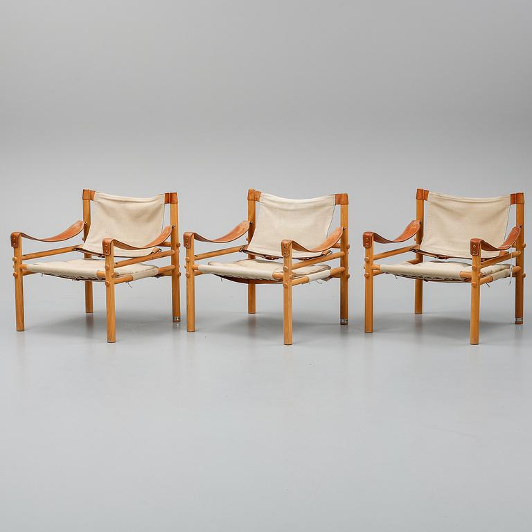 Arne Norell, a set of three "Sirocco" armchairs and two tables, Norell.