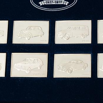 Plaketter, 12 st, silver, "De Historiska Volvobilarna 1927-1977", Franklin Mint.