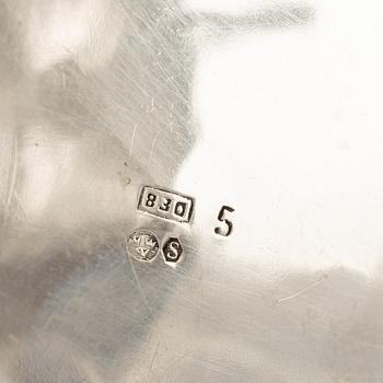 A Rococo-style silver coffee pot, creamer and sugar bowl, 20th Century.