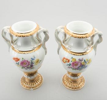 A PAIR OF MEISSEN PORCELAIN URNS.