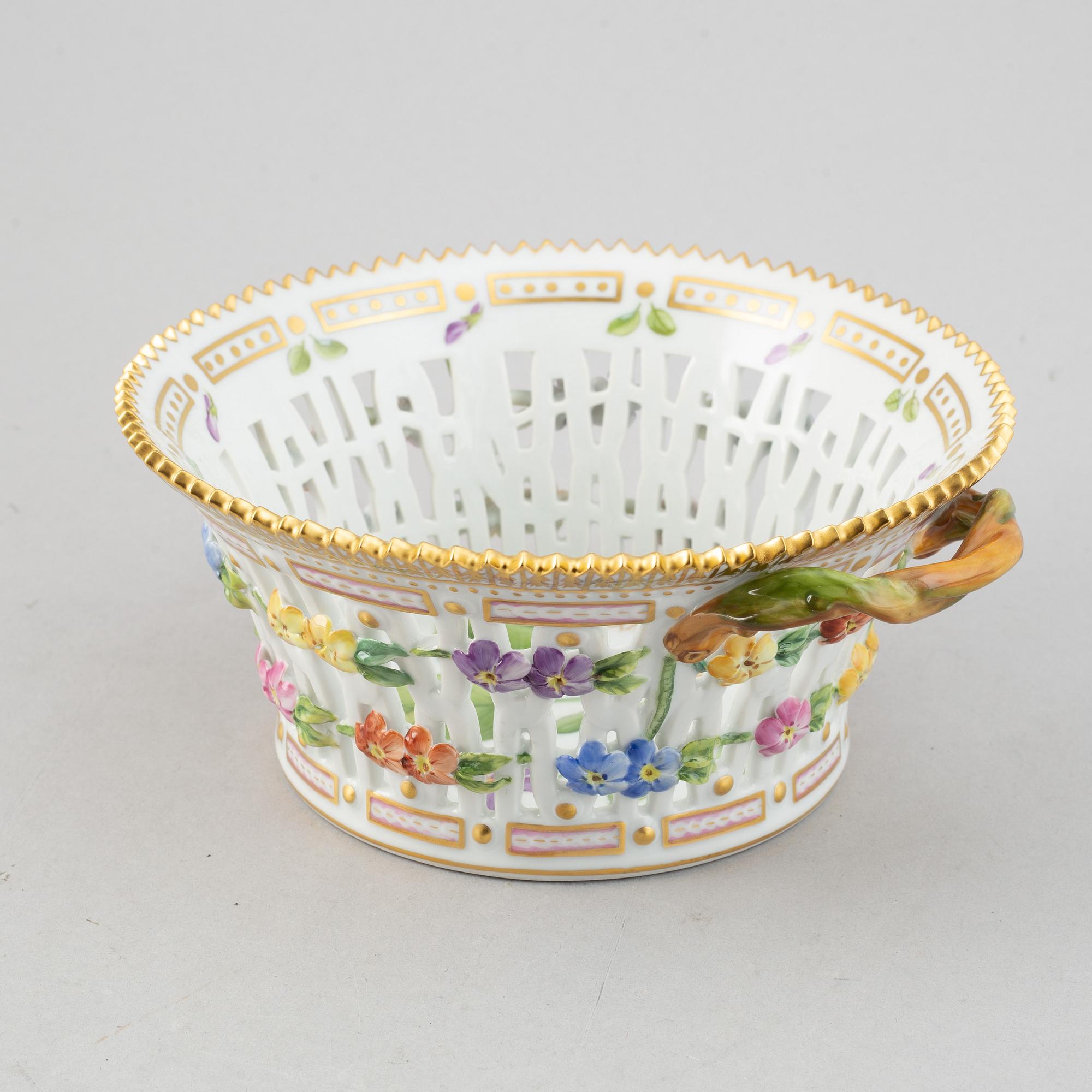 A Royal Copenhagen "Flora Danica" chesnut baskets with stands, Denmark, mid 20th Century.