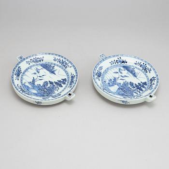 A pair of blue and white hot water dishes, Qing dynasty, Qianlong (1736-95).