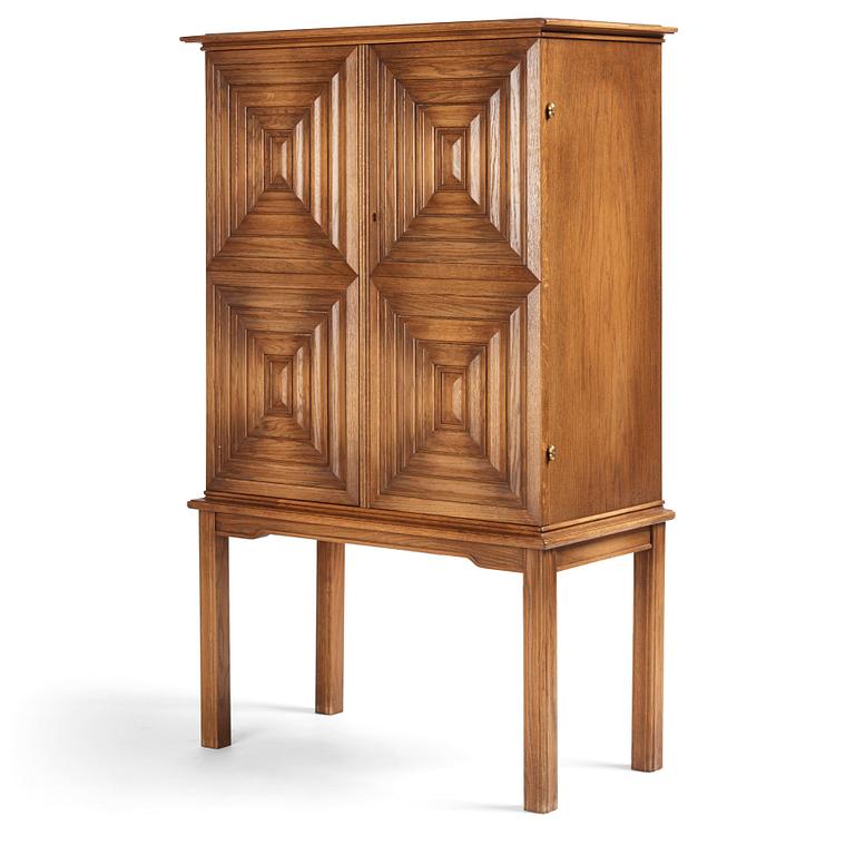 Oscar Nilsson, attributed to, a Swedish Modern oak cabinet, likely executed by Åfors Möbelfabrik, 1940s.